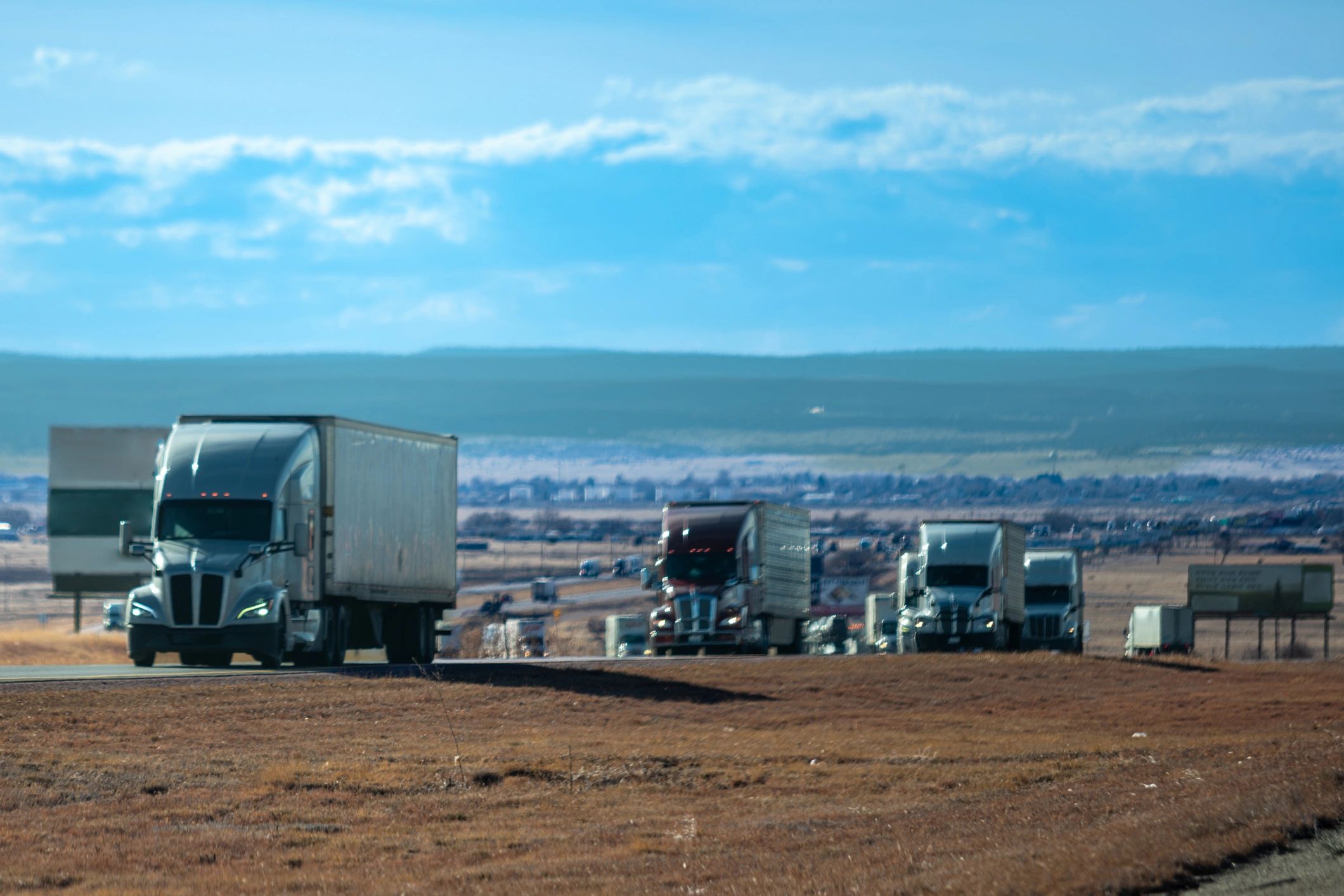 Commercial trucks staged in a lineup